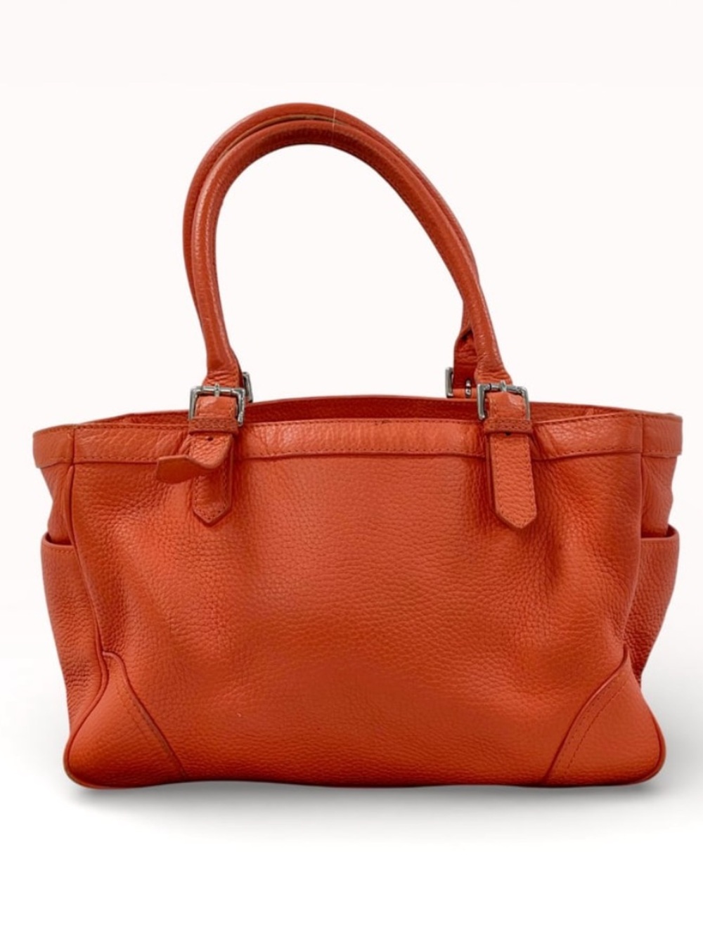 Ralph Lauren hand bag pebbled leather exterior in a warm orange color